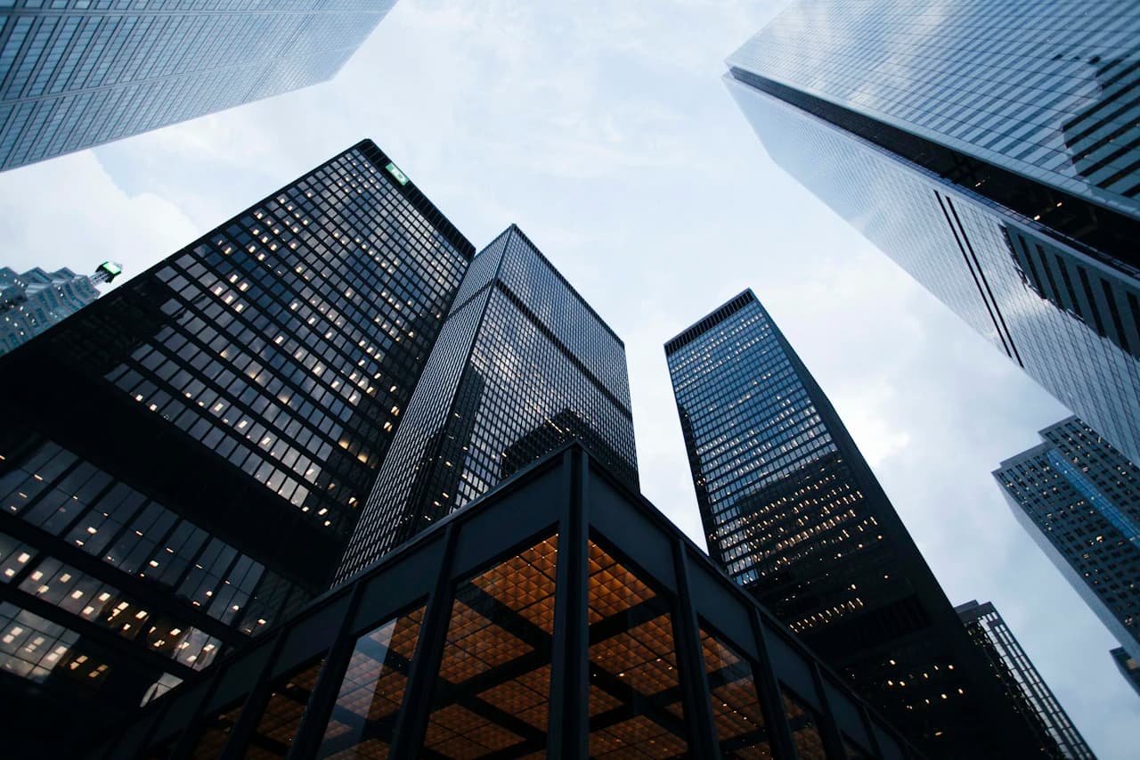 Modern glass building against blue sky
